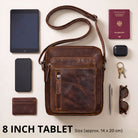 Kleine Dain Schultertasche aus braunem Rindsleder salerno, liegendes Frontmotiv mit 8-Zoll-Tablet und Zubehör